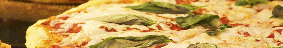 Eating Italian Pizza at Romanos Pasta & Pizzeria restaurant in San Clemente, CA.
